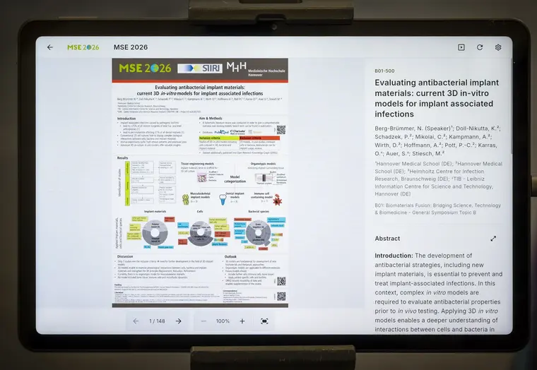 Digital poster panel showing a released poster