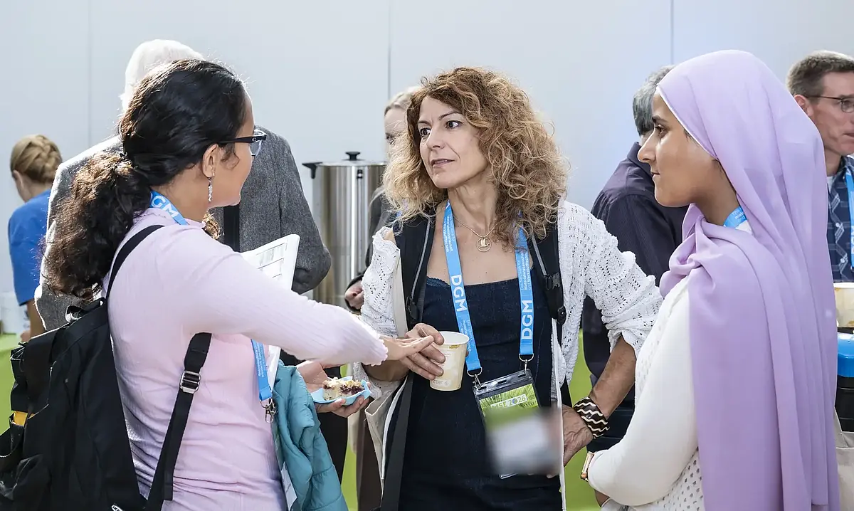 Participants sharing ideas at a scientific conference